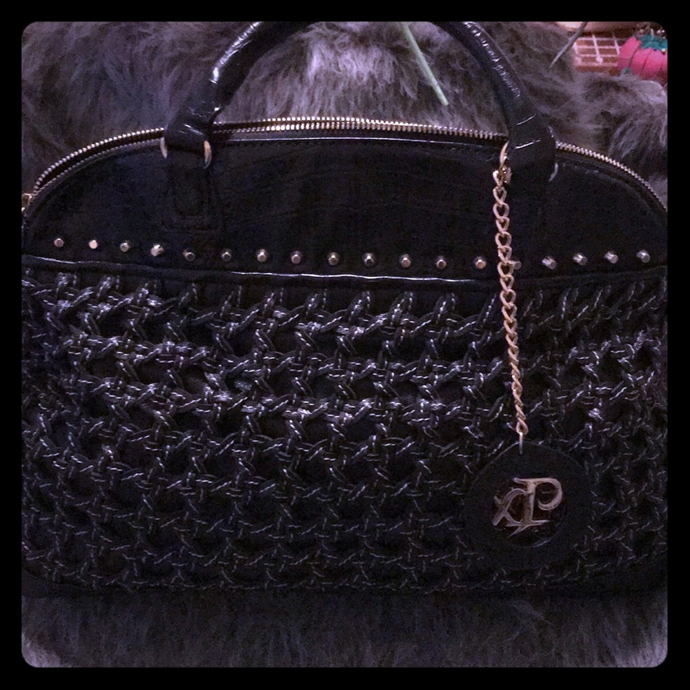 Black purse with animal print interior